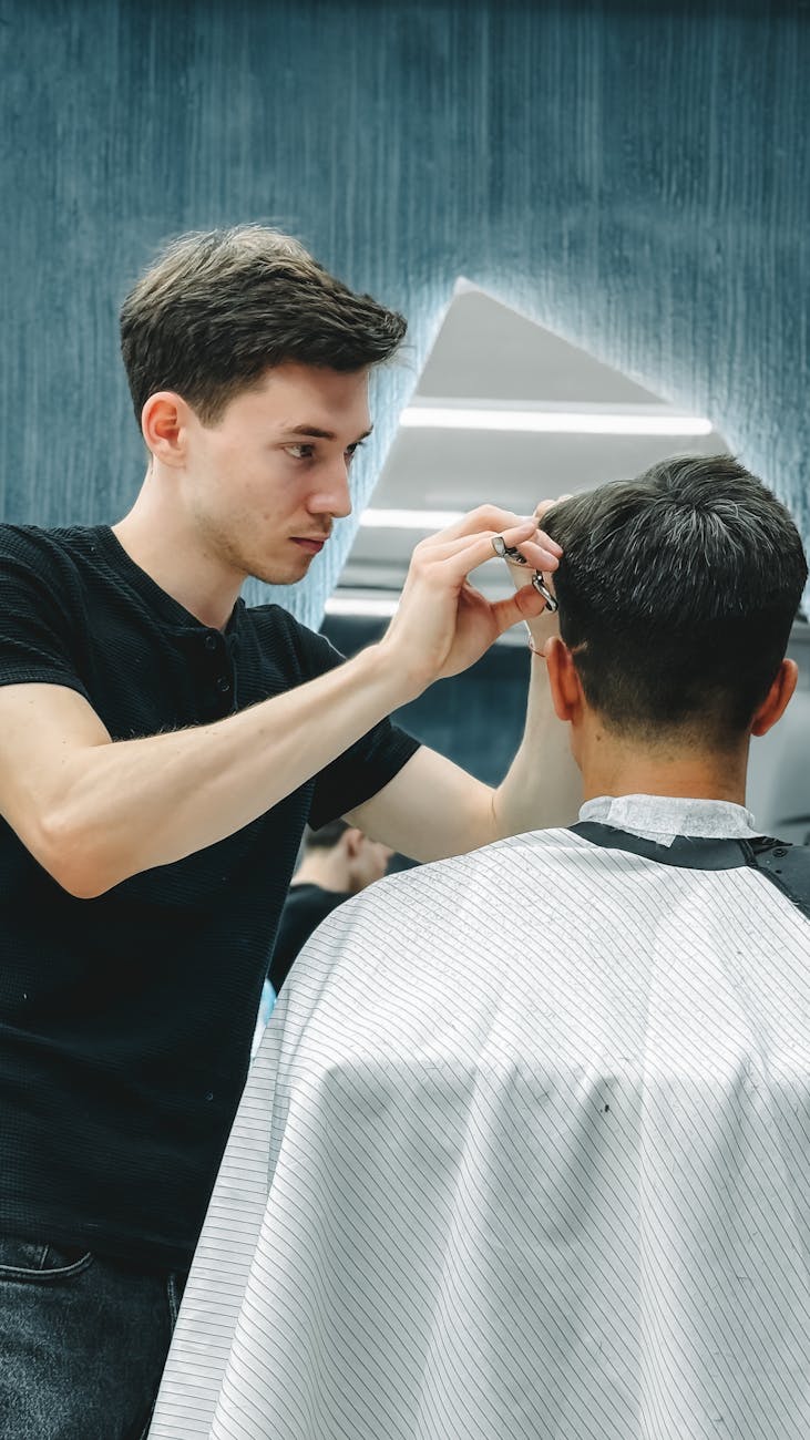professional haircut in modern barbershop